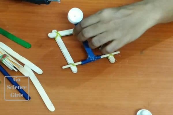 catapult design with spring and ice sticks