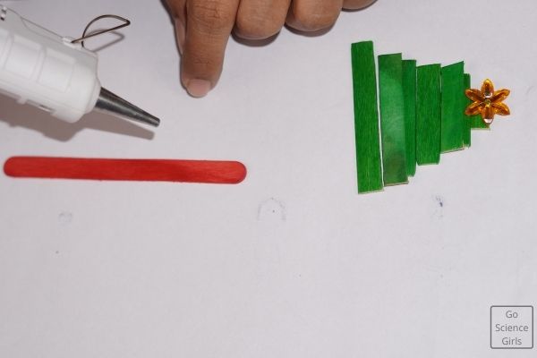 Paste Green Popsicle Sticks On The Red Stick