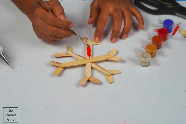Painting Popsicle Stick Snowflakes Christmas Ornaments