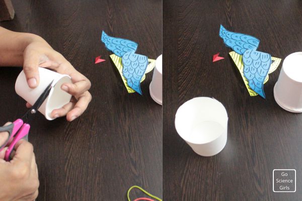 cut the edge of the paper cup to make base for rocket