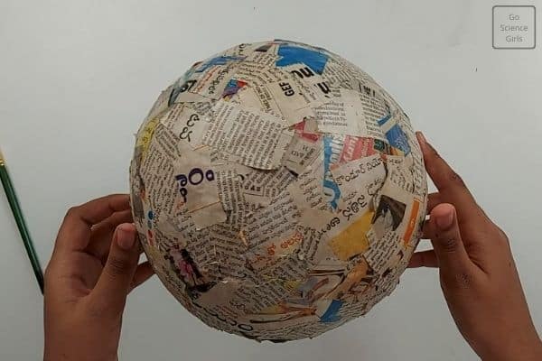 cover the ball with newspaper 